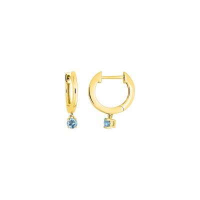 Boucles d'oreilles créoles en or jaune et topaze bleue