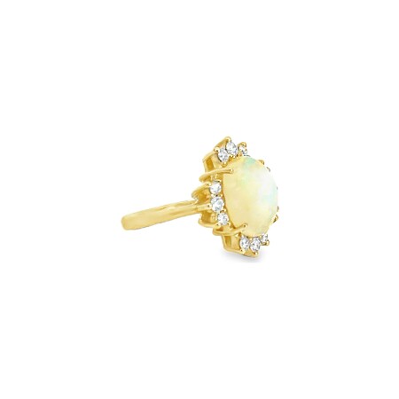 Bague en or jaune, opale et diamants