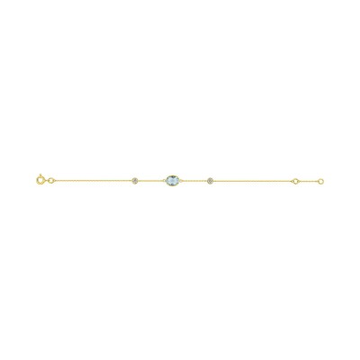 Bracelet en or jaune, topaze bleue et oxyde de zirconium