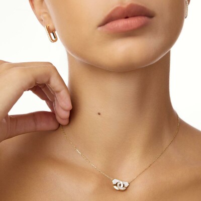 Collier dinh van Menottes dinh van en or jaune et nacre, petit modèle