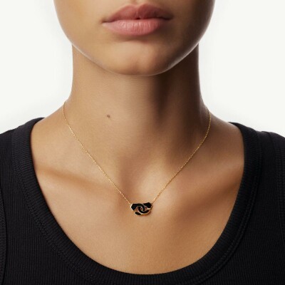 Collier dinh van Menottes dinh van en or jaune et onyx, petit modèle