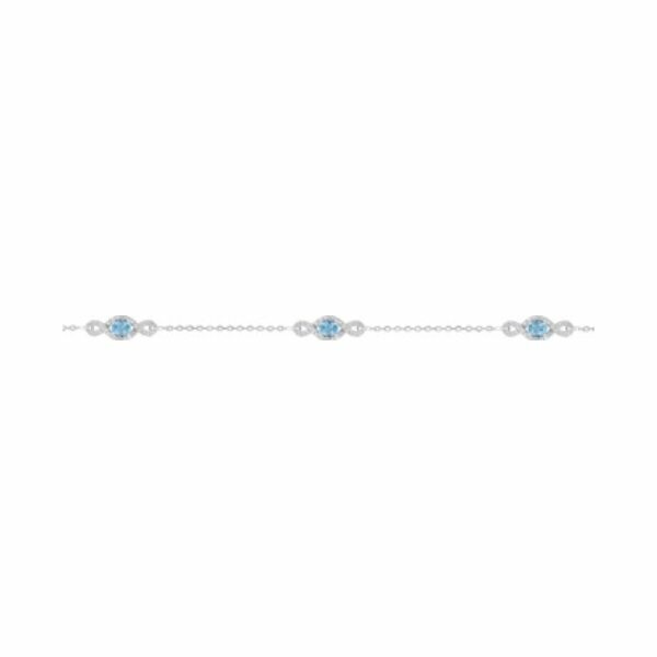 Bracelet en or blanc et oxyde de zirconium, topaze bleue