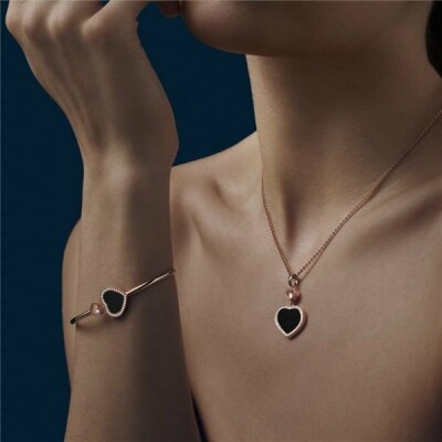 Pendentif Chopard Happy Hearts en or rose, onyx et diamants