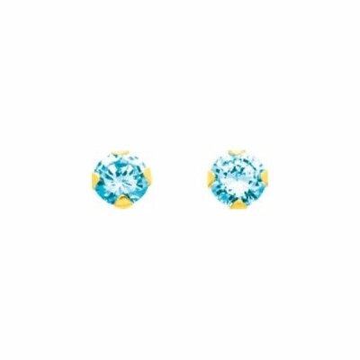 Boucles d'oreilles en or jaune et topaze bleue