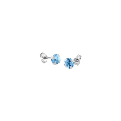 Boucles d'oreilles en or blanc et topaze bleue
