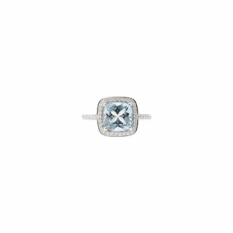 Solitaire ring in white gold, blue topaz and diamonds