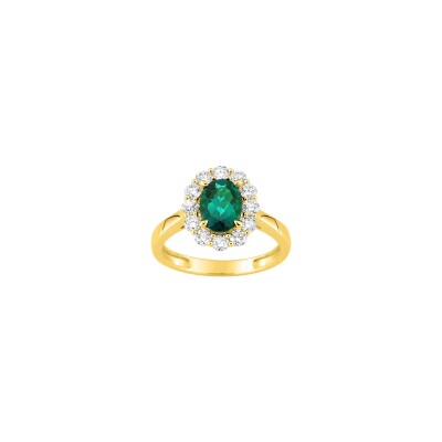 Bague en or jaune, diamant 0.65ct et émeraude