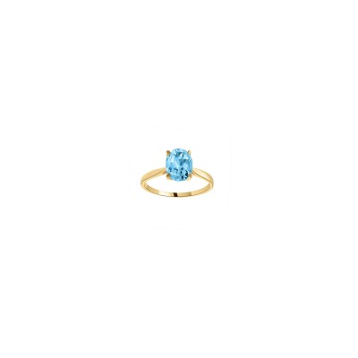 Bague en or jaune et topaze bleue
