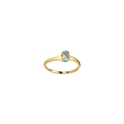 Bague en or jaune et topaze bleue