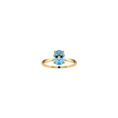 Bague en or jaune et topaze bleue