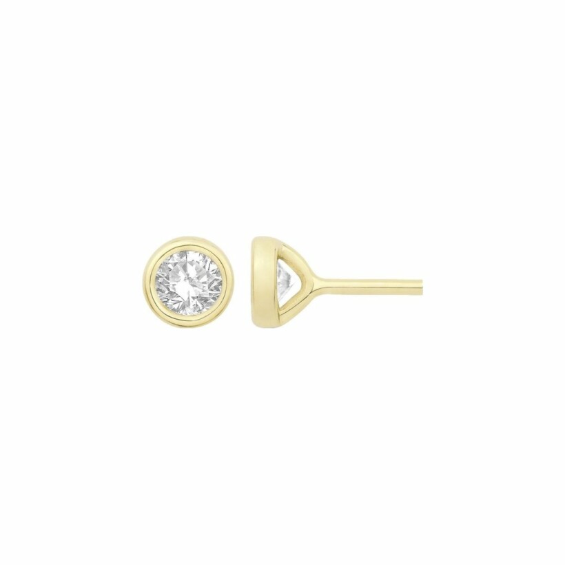 Boucles d'oreilles  en or jaune et diamants Serti clos de 0.20ct