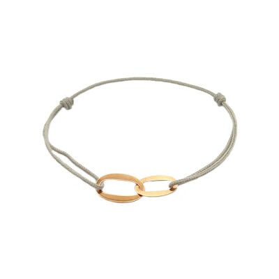 Bracelet sur cordon double motif ovale en or rose