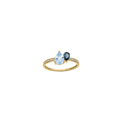 Bague en or jaune, topaze bleue et oxyde de zirconium