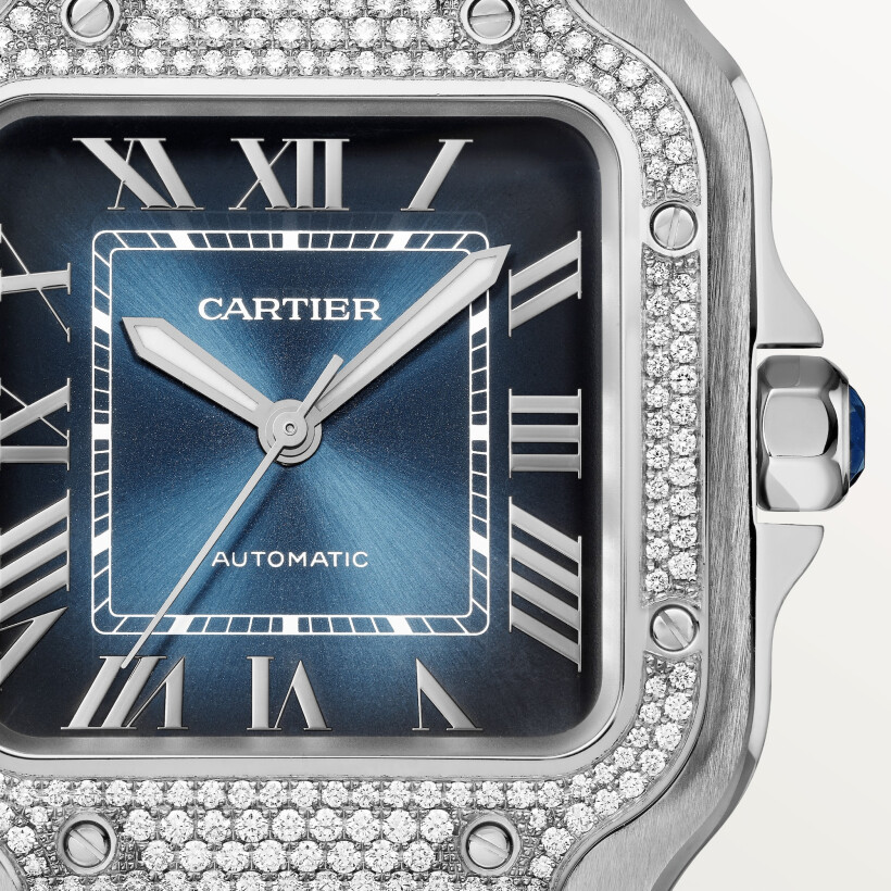 Montre Santos de Cartier Moyen modèle, mouvement automatique, acier, diamants, cadran bleu, bracelets métal et cuir interchangeables