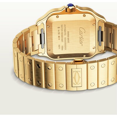 Santos de Cartier watch Large model, automatic movement, yellow gold, interchangeable metal and leather bracelets