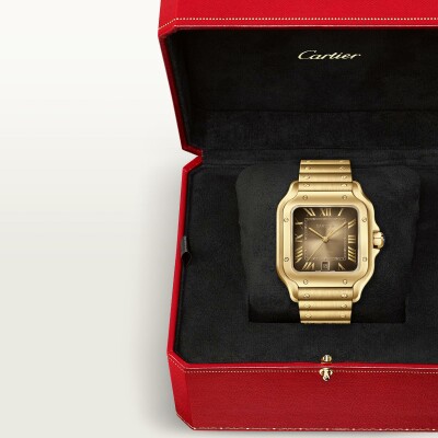 Santos de Cartier watch , large model, automatic movement, yellow gold, interchangeable metal and leather straps