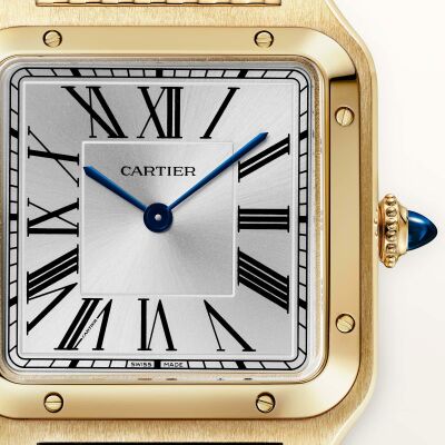 Montre Santos-Dumont de Cartier Grand modèle, mouvement manuel, or jaune, bracelet métal interchangeable