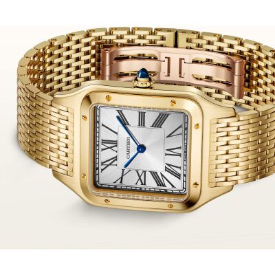 Montre Santos-Dumont de Cartier Grand modèle, mouvement manuel, or jaune, bracelet métal interchangeable