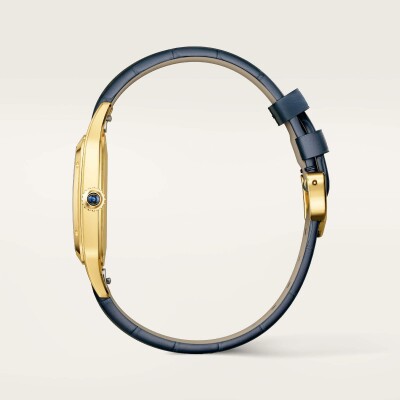Montre Santos-Dumont de Cartier Grand modèle, mouvement manuel, or jaune, cuir