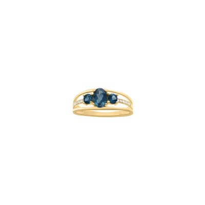 Bague en or jaune, topaze bleu London et oxyde de zirconium