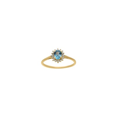 Bague en or jaune, oxyde de zirconium et topaze bleue