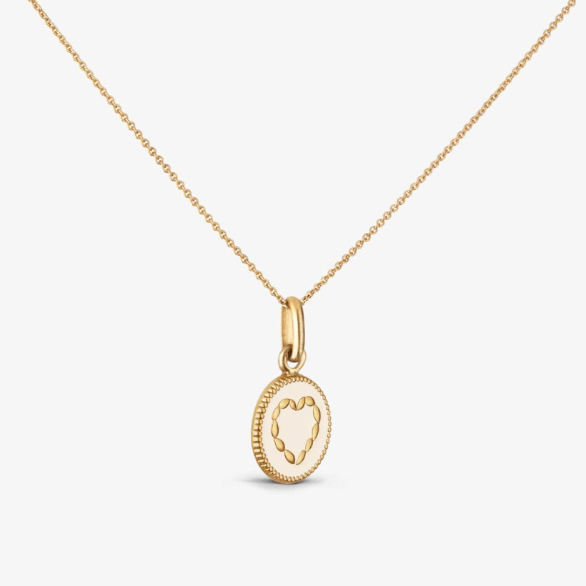 Arthus Bertrand heart medal in polished yellow gold and ivory lacquer