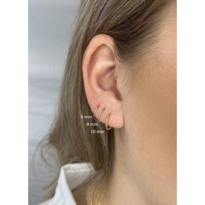 Boucles d'oreilles créoles Jackie Gold torsadées en or jaune