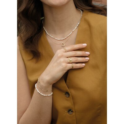 Bague Jackie Gold Triple en or jaune et topaze blanche