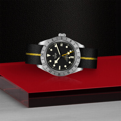 TUDOR Black Bay Pro watch,39 mm steel case, black fabric strap with yellow band