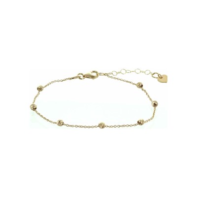 Bracelet sept boules striées en or jaune