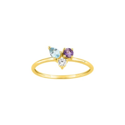 Bague en or jaune, oxyde de zirconium et topaze bleue