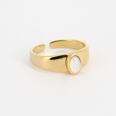 Bague ZAG en acier doré et nacre blanche