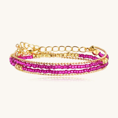 Bracelet Sàntibé Bijoux Divine en laiton, métal doré et perles fuchsia
