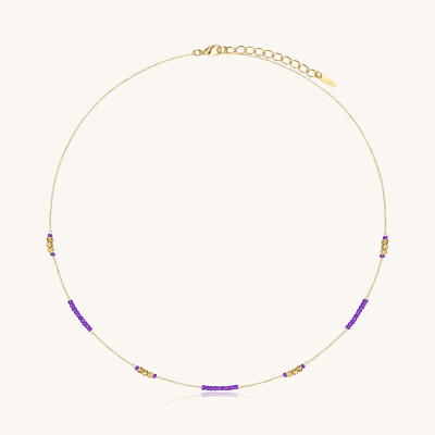 Collier Sàntibé Bijoux Murmure Rond en laiton, métal doré et perles ultra violet