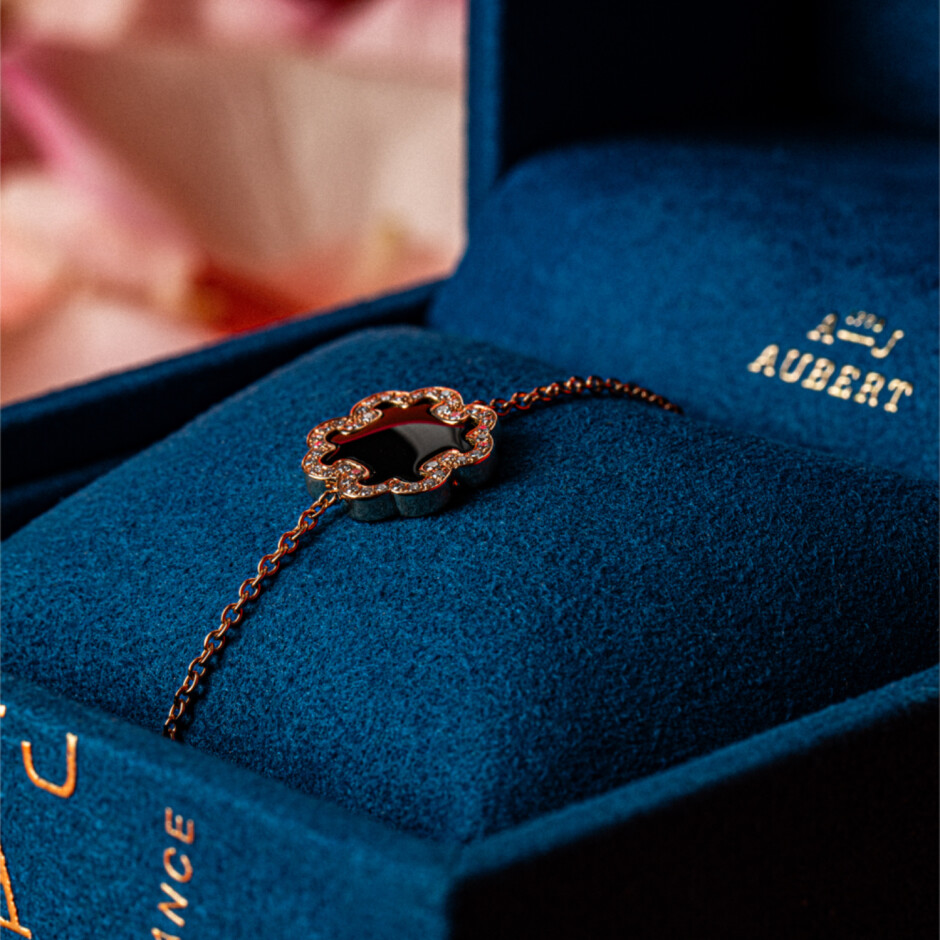 Bracelet A-J Aubert Volutes en or rose, diamants et onyx