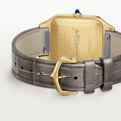 Montre Santos-Dumont de Cartier Grand modèle, mouvement manuel, or jaune, cuir