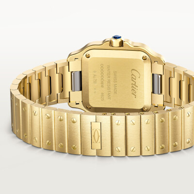 Montre Santos de Cartier Petit modèle, mouvement quartz, or jaune, bracelets métal et cuir interchangeables