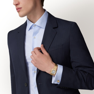 Montre Santos de Cartier Petit modèle, mouvement quartz, or jaune, bracelets métal et cuir interchangeables