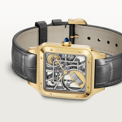 Montre squelette Santos-Dumont équipée d’un micro-rotor de Cartier Grand modèle, mouvement automatique squelette, or jaune, 2 bracelets cuir