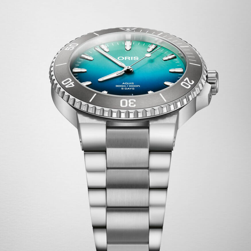Lunette tournante et boîtier d’une montre Oris Aquis