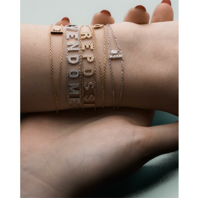 Bracelet Repossi Letters Serti sur Vide en or rose et diamants