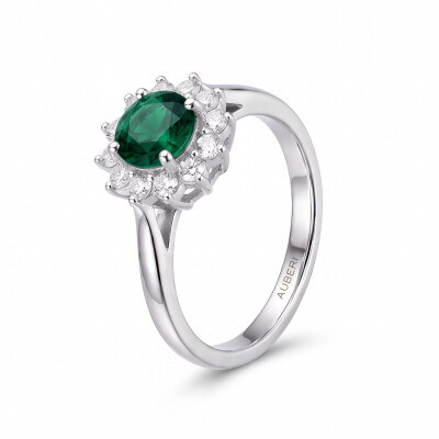 Solitaire Colette Marguerite en or blanc palladié, émeraude de 0.27cts et 12 diamants ronds brillants de 0.17ct