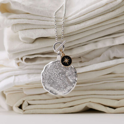 Pendentif Arthus Bertrand Etoile noire en or jaune et diamant