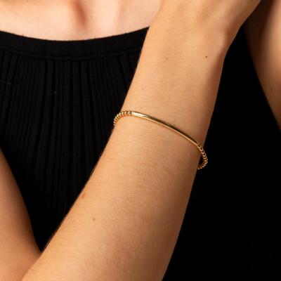 Bracelet souple avec plaque en or jaune