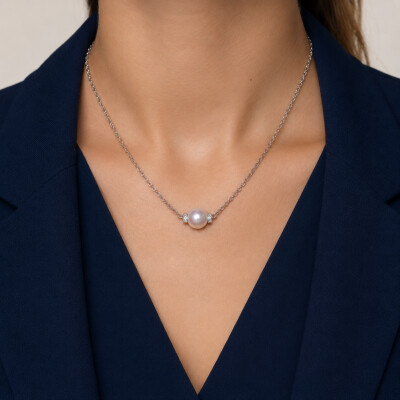 Collier en or blanc, perle d'eau douce et pavage diamants