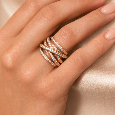 Bague croisée en or rose et diamants