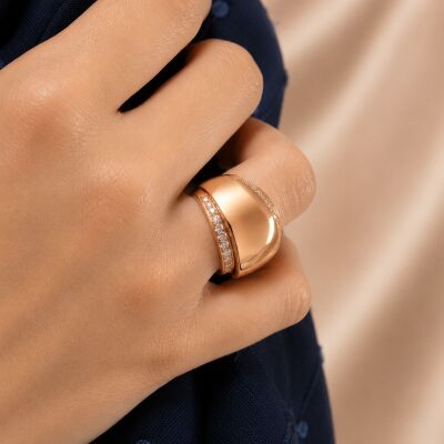 Bague en or rose deux demi-tours pavage diamants