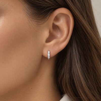 Boucles d'oreilles créoles Infini en or blanc et diamants