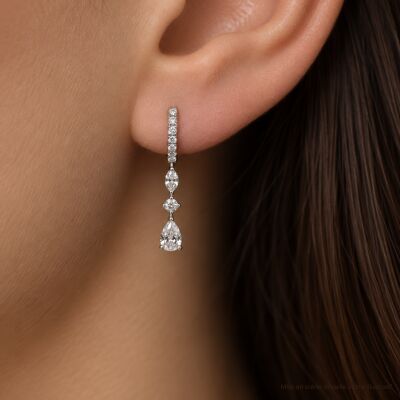 Boucles d'oreilles pendantes Infini en or blanc et diamants
