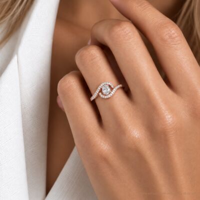 Bague 1897 en or rose et diamants